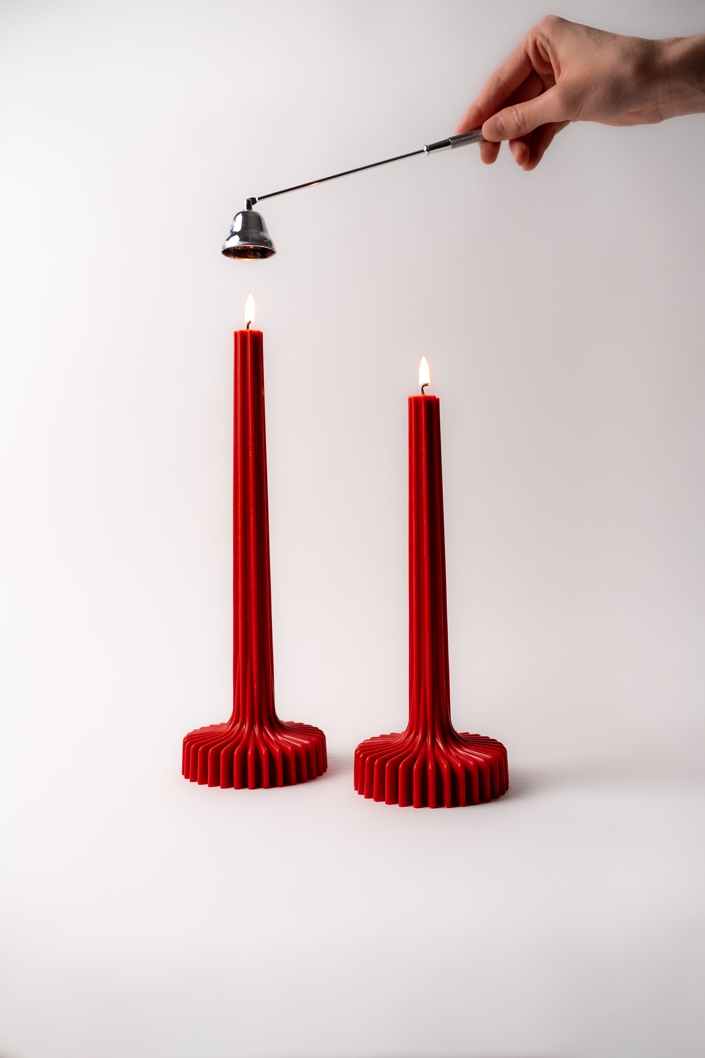 set of red ribby candles