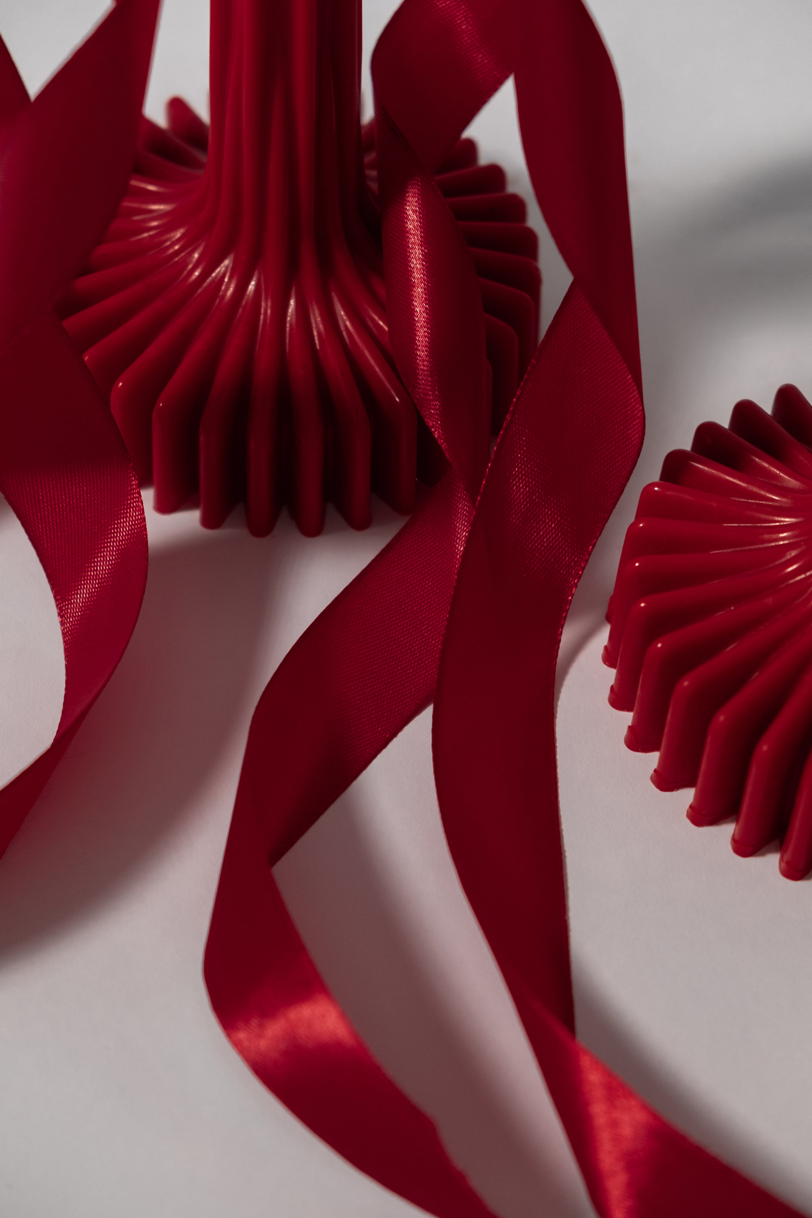 set of red ribby candles